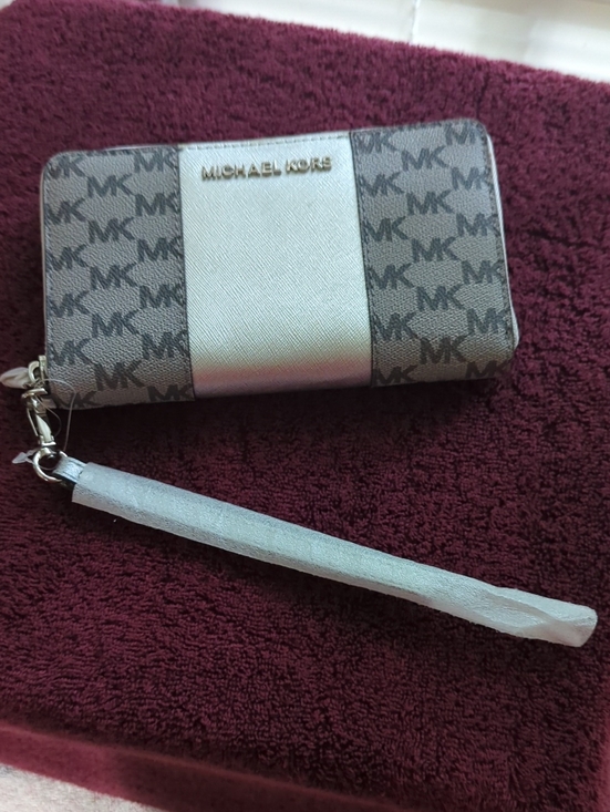 Michael Kors Handbags - Michael Kors Gray and Silver MK Zip Wristlet New With Tags...